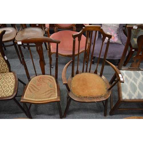 223 - An Edwardian inlaid mahogany corner armchair and four other chairs.