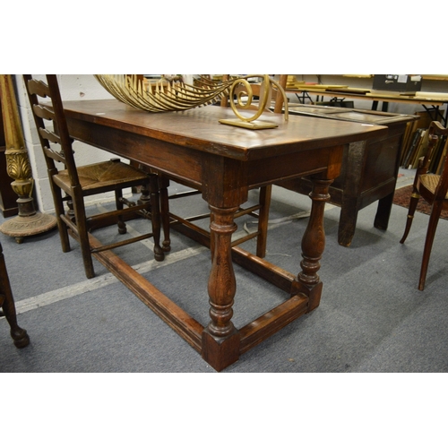 238 - An oak refectory dining table.