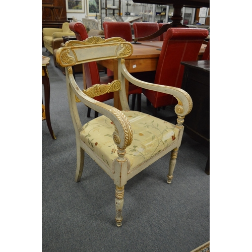 247 - A pair of decorative carved, painted and parcel gilded open armchairs.