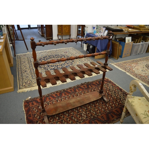 274 - A Victorian mahogany hunting boot and whip rack.