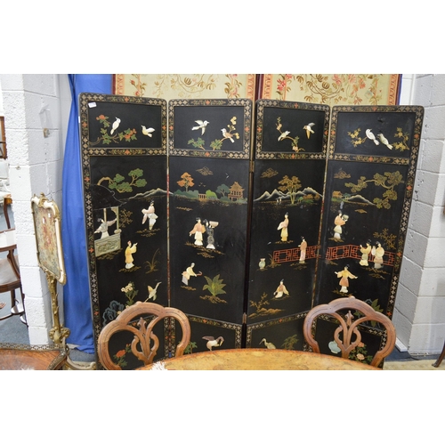 277 - A decorative Chinese four panelled dressing screen.