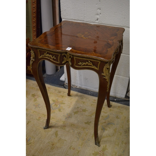 283 - A decorative French style occasional table.