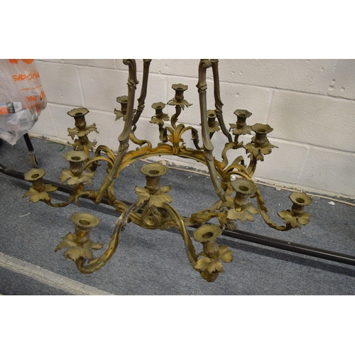 287 - A good large ornate cast bronze sixteen branch chandelier.