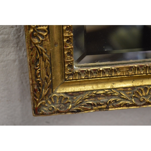 297 - A gilt framed dressing mirror.