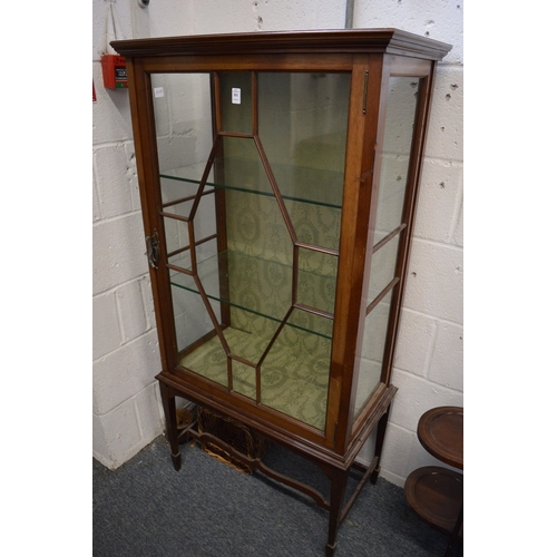 301 - A mahogany standing display cabinet.