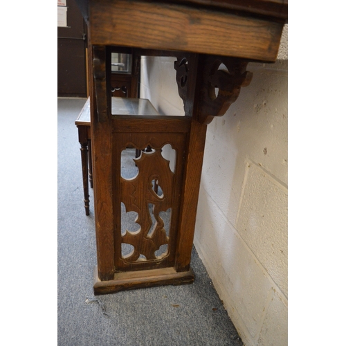 304 - A good Chinese softwood altar table with carved and pierced supports.