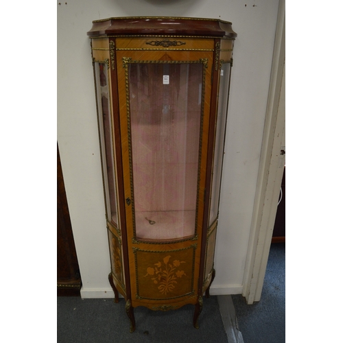 311 - A French style vitrine with inlaid decoration.