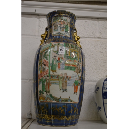 434 - A large Chinese vase, blue ground with gilded decoration painted with panels of figures in a courtya... 