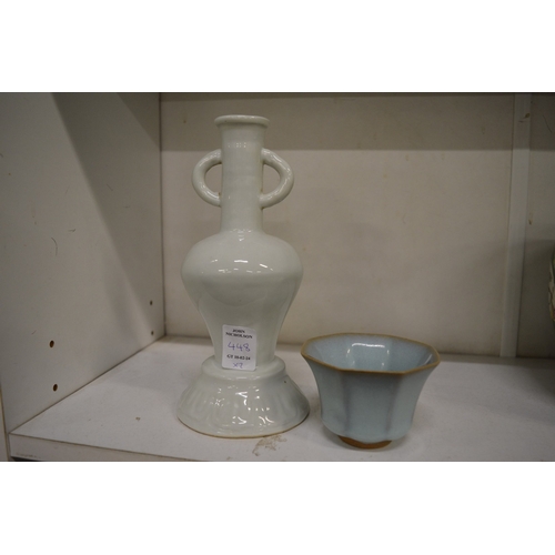 448 - A small Chinese blue glazed bowl and a blanc de chine incense stick holder.