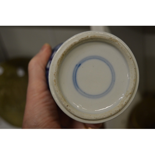 463 - Chinese blue and white baluster shaped vase and cover together with three ginger jars.