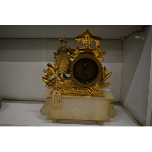 474 - An alabaster and gilt metal French mantel clock.