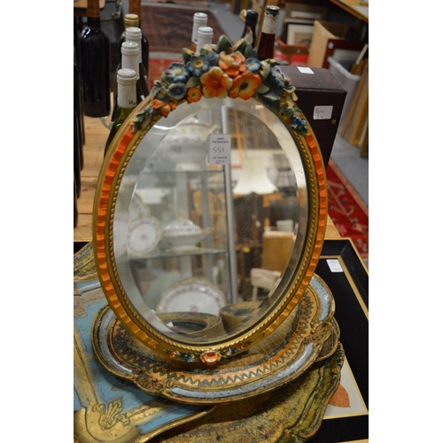 551 - An ormolu twin branch wall light, decorative trays and a mirror.