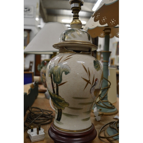 610 - Two pottery table lamps.