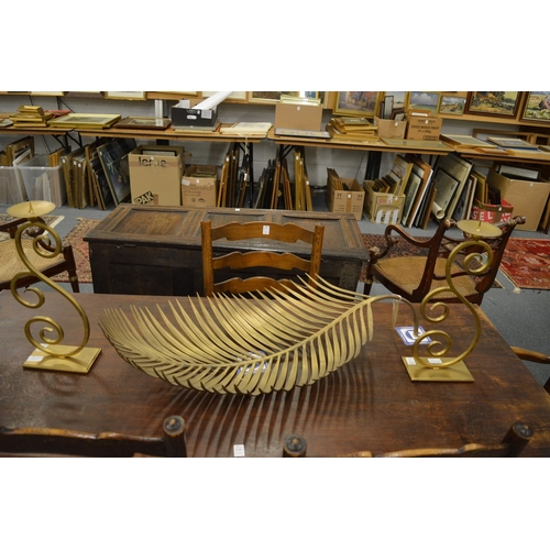 638 - An unusual large bronze leaf shaped dish and a pair of heavy brass candlesticks.