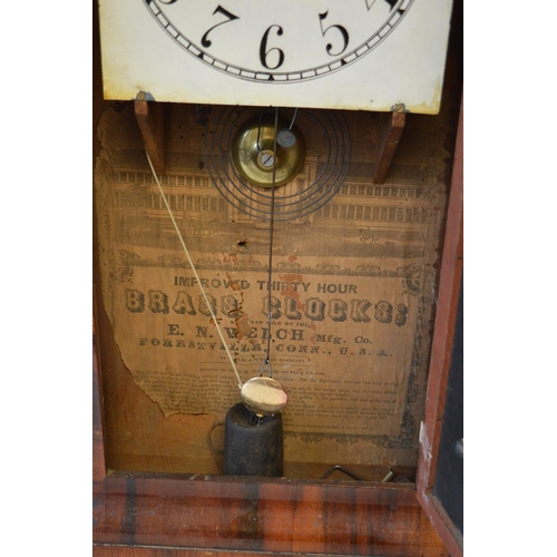 655 - An American mahogany cased wall clock.