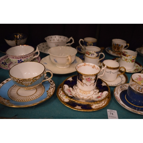 71 - A collection of tea and coffee cups with saucers, some trio's.