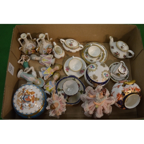 745 - Porcelain pin dollies and other collectable miniature china to include a Coalport Ming Rose miniatur... 