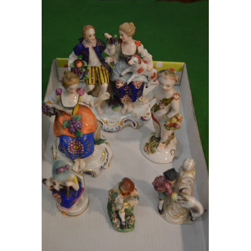 747 - A small group of 19th century and later porcelain figures.