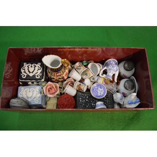 750 - A collection of miniature porcelain and collectable to include a Crown Derby jug, thimbles etc.