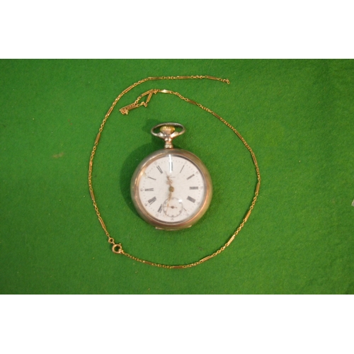 776 - A Continental silver cased pocket watch and a yellow metal chain.