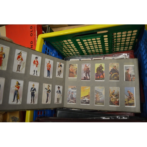 96 - A large quantity of cigarette and other collectors cards, several in albums.