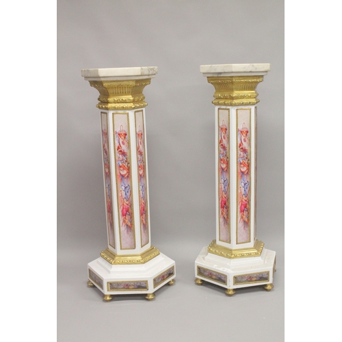 1025 - A SUPERB PAIR OF OCTAGONAL INLAID MARBLE COLUMNS with gilt metal mounts. 4ft high.