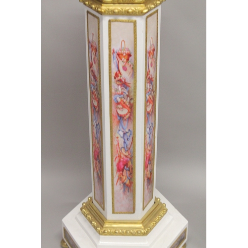 1025 - A SUPERB PAIR OF OCTAGONAL INLAID MARBLE COLUMNS with gilt metal mounts. 4ft high.