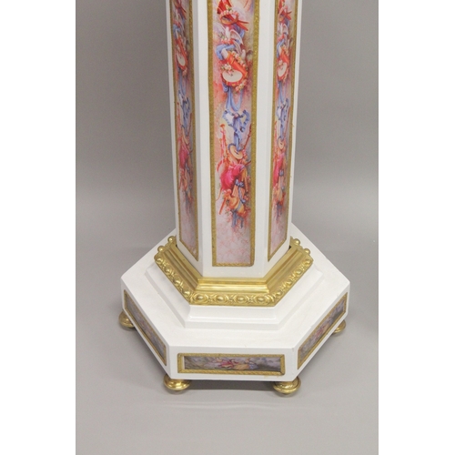 1025 - A SUPERB PAIR OF OCTAGONAL INLAID MARBLE COLUMNS with gilt metal mounts. 4ft high.