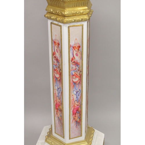 1025 - A SUPERB PAIR OF OCTAGONAL INLAID MARBLE COLUMNS with gilt metal mounts. 4ft high.