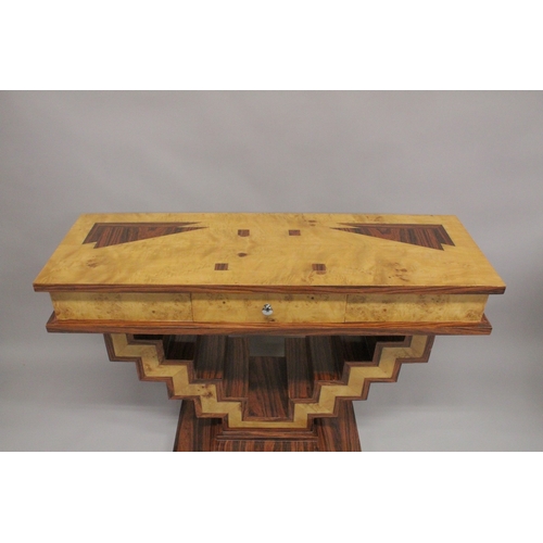 1026 - A GOOD INLAID ART DECO DESIGN SIDE TABLE with central drawer and zig zag supports. 4ft long x 1ft 4i... 