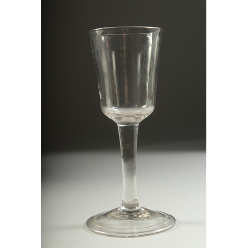 1043 - A PLAIN GEORGIAN WINE GLASS with bucket bowl. 6ins high.