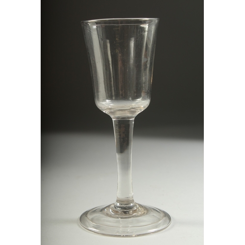 1043 - A PLAIN GEORGIAN WINE GLASS with bucket bowl. 6ins high.