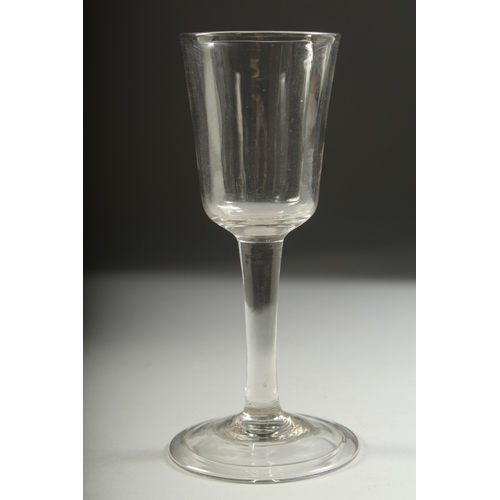 1043 - A PLAIN GEORGIAN WINE GLASS with bucket bowl. 6ins high.