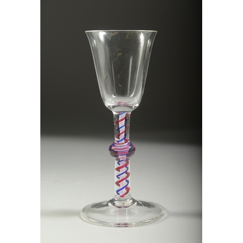 1044 - A WINE GLASS with knop stem and blue and white twist stem. 6ins high.