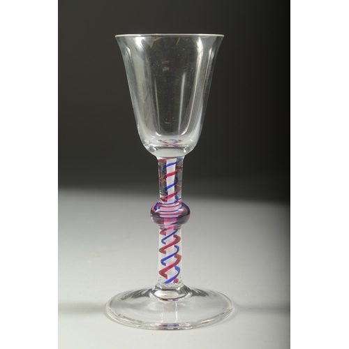 1044 - A WINE GLASS with knop stem and blue and white twist stem. 6ins high.