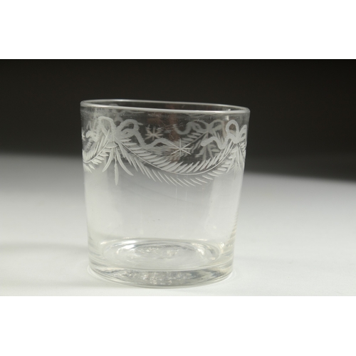 1046 - A GEORGAIN BEAKER engraved with garlands. 3.25ins high.