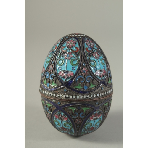 1644 - A GOOD RUSSIAN SILVER AND ENAMEL EGG CIRCA 1890 - 1900. Marks very dirty.