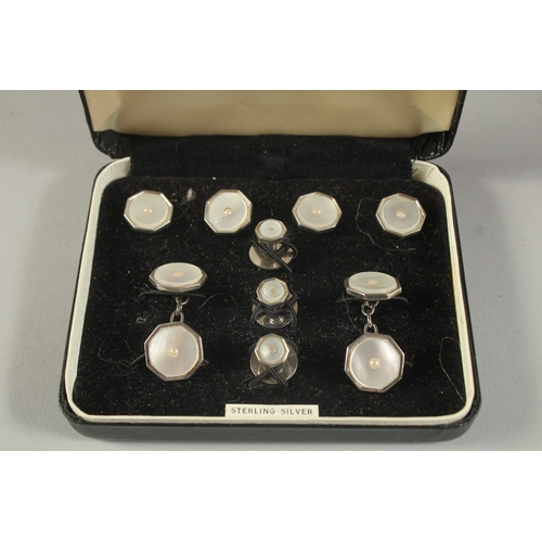 1645 - A HARRODS LTD SET OF SILVER AND MOTHER-OF-PEARL DRESS STUDS AND CUFFLINKS, cased.