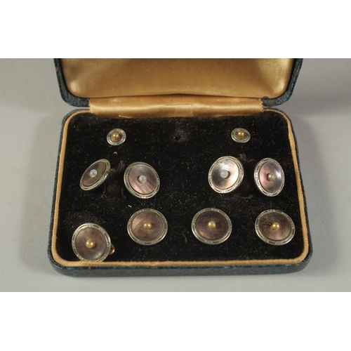 1646 - A KREMENTZ SET OF SILVER AND MOTHER-OF-PEARL DRESS STUDS AND CUFFLINKS, cased.