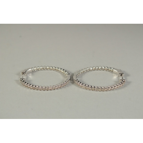 1775 - A PAIR OF WHITE GOLD AND DIAMOND HOOP EARRINGS.