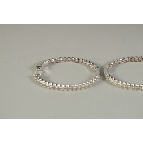 1775 - A PAIR OF WHITE GOLD AND DIAMOND HOOP EARRINGS.