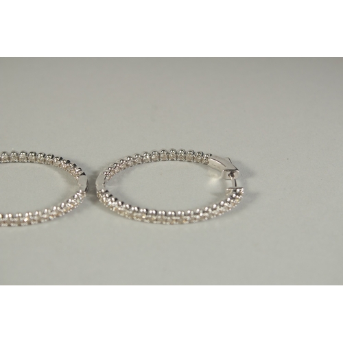 1775 - A PAIR OF WHITE GOLD AND DIAMOND HOOP EARRINGS.