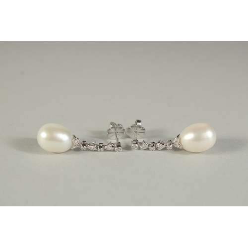 1776 - A PAIR OF 18CT WHITE GOLD, DIAMOND AND PEARL DROP EARRINGS.