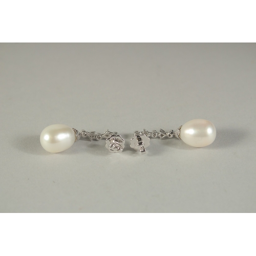 1776 - A PAIR OF 18CT WHITE GOLD, DIAMOND AND PEARL DROP EARRINGS.