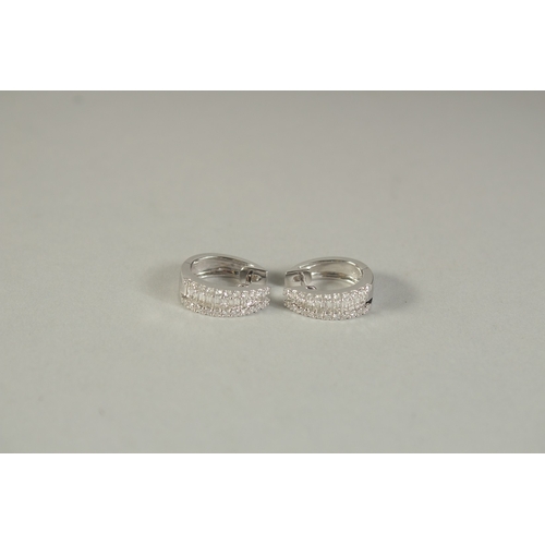 1779 - A PAIR OF 18CT WHITE GOLD BAGUETTE CUT HOOP EARRINGS.