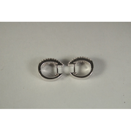 1779 - A PAIR OF 18CT WHITE GOLD BAGUETTE CUT HOOP EARRINGS.