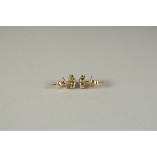 1780 - A PAIR OF 18CT YELLOW GOLD, DIAMOND AND EMERALD FLOWER HEAD EAR STUDS.