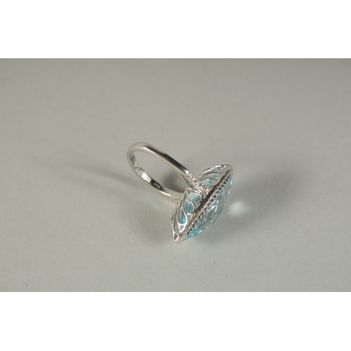 1782 - A GOOD 18CT WHITE GOLD, DIAMOND AND BLUE TOPAZ MARQUISE CUT RING.