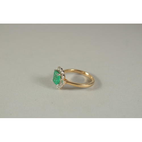 1784 - AN 18CT YELLOW GOLD, DIAMOND, EMERALD OCTAGONAL SHAPE CLUSTER RING.