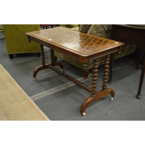 250 - A good parquetry inlaid Victorian walnut stretcher table.